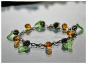 Жаркая индийская ночь - браслет. Цепочка с металлическими бусинами (шариками) и листьями на концах